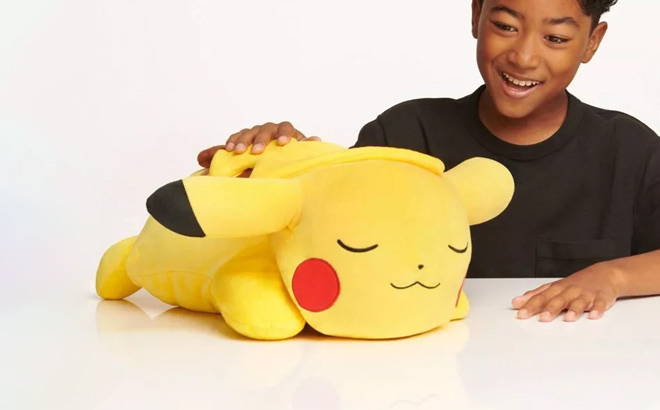 Pokemon Pikachu Sleeping Cuddle Plush Buddy Toy on the Table